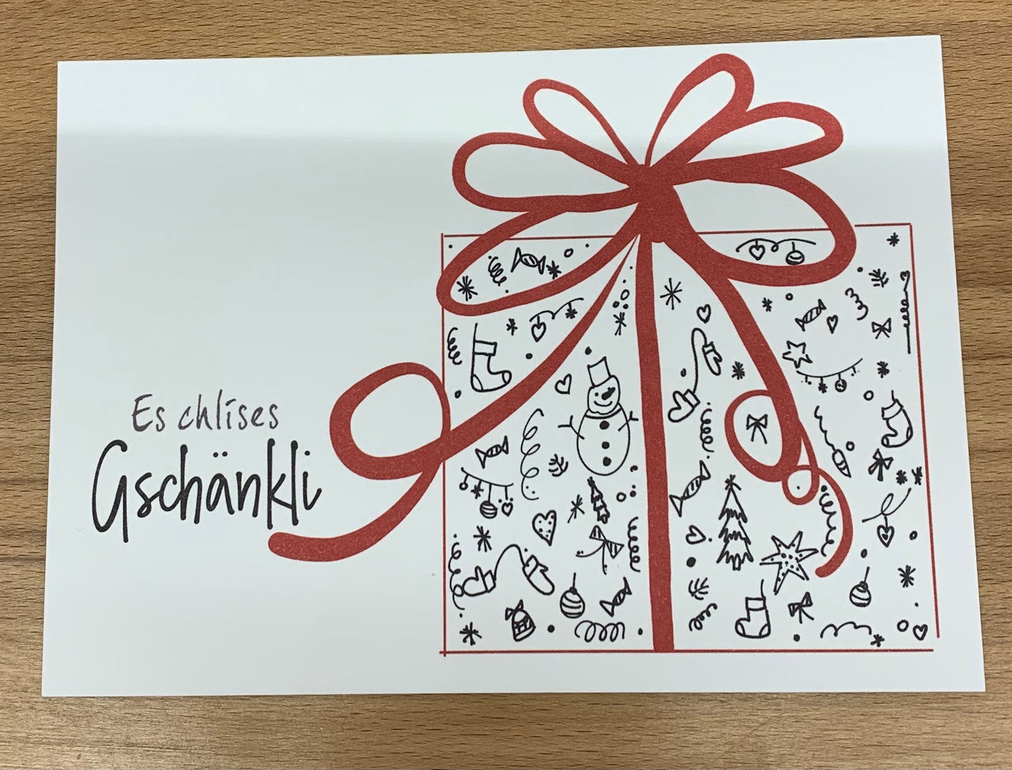 Postkarte Es Chlises Geschänkli