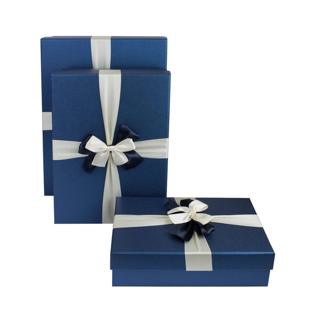 Rechteckigen, blaue Geschenkbox, cremefarbenem Band